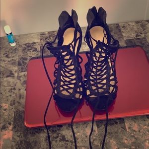 Lace up high heels.